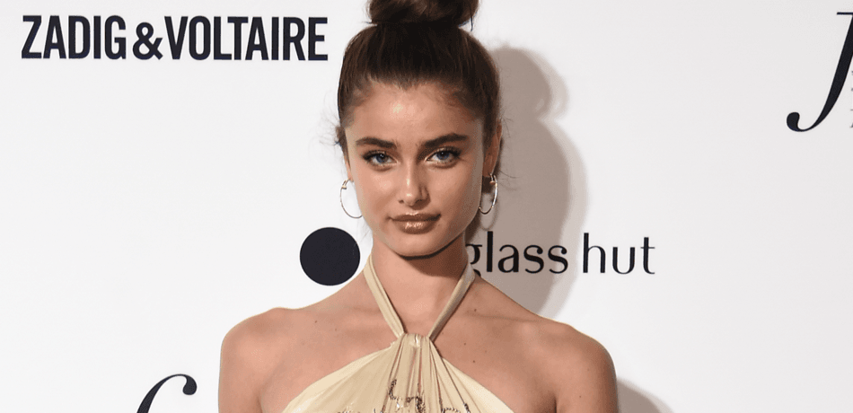 Taylor Hill Celebrates Spring Flowers In Iconic Pink Floyd Shirt On Instagram