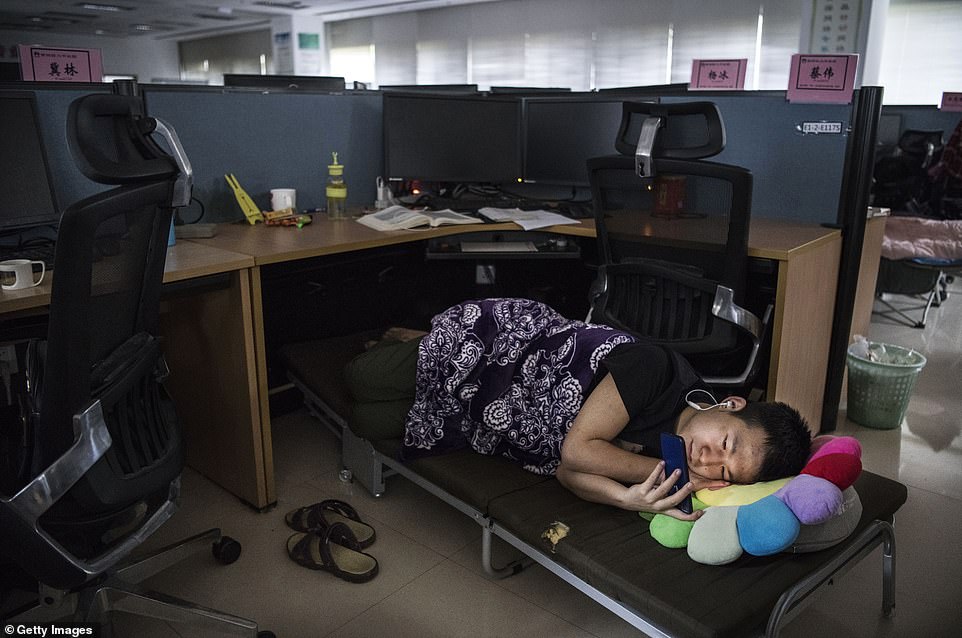 Inside Huawei’s manufacturing empire – including the £1.2billion ‘research and development’ campus where staff sleep under desks during shifts