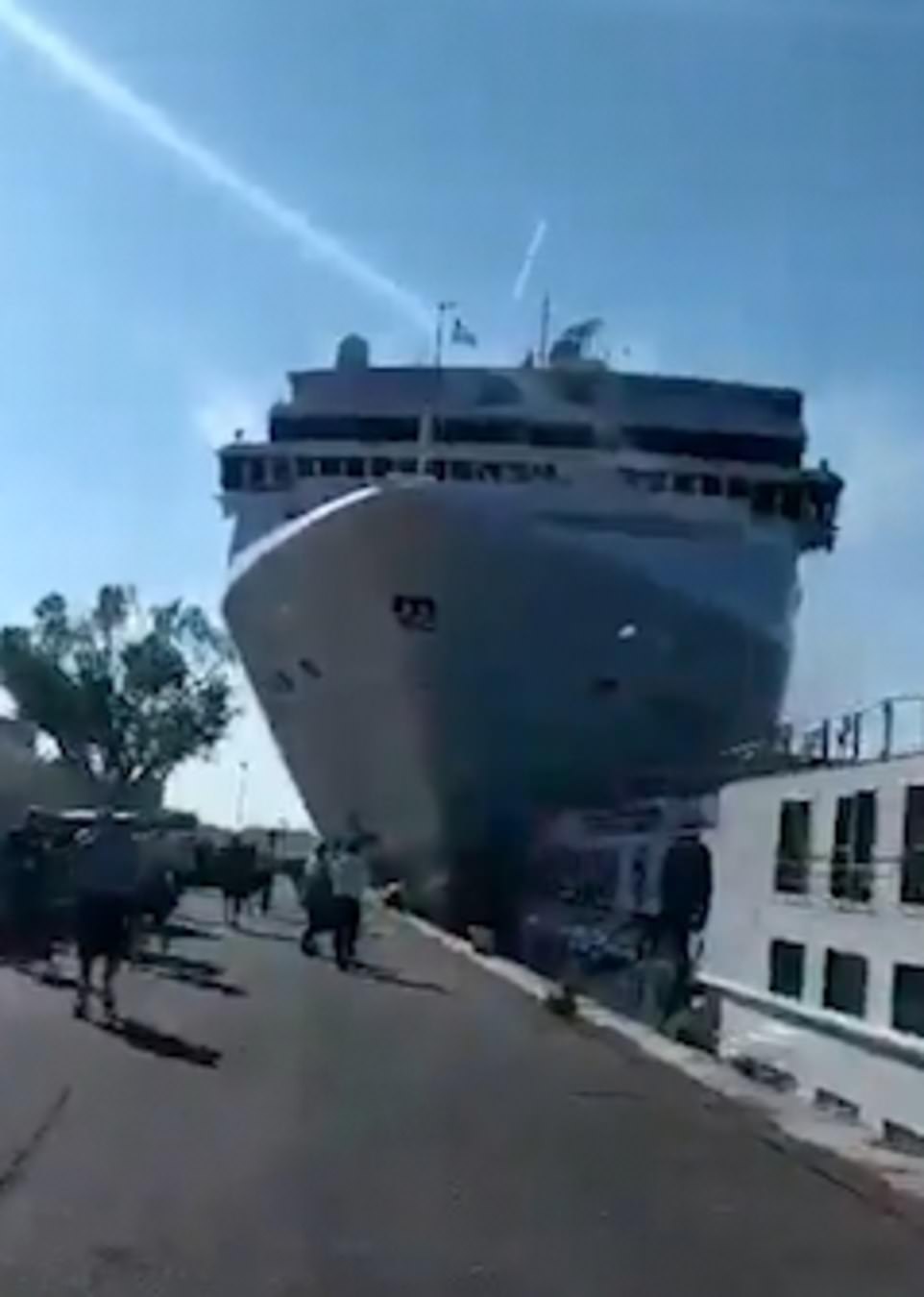 Horrifying moment passengers topple off a tourist river boat