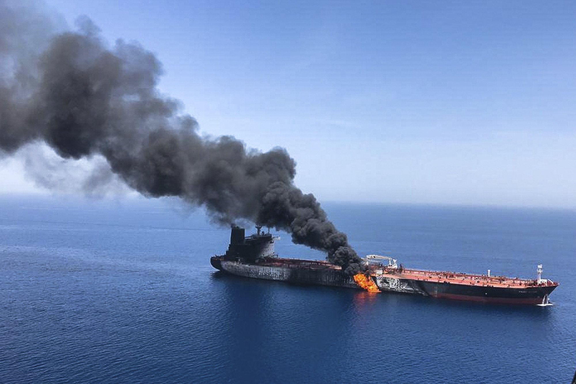 Tankers struck near Strait of Hormuz; US blames Iran