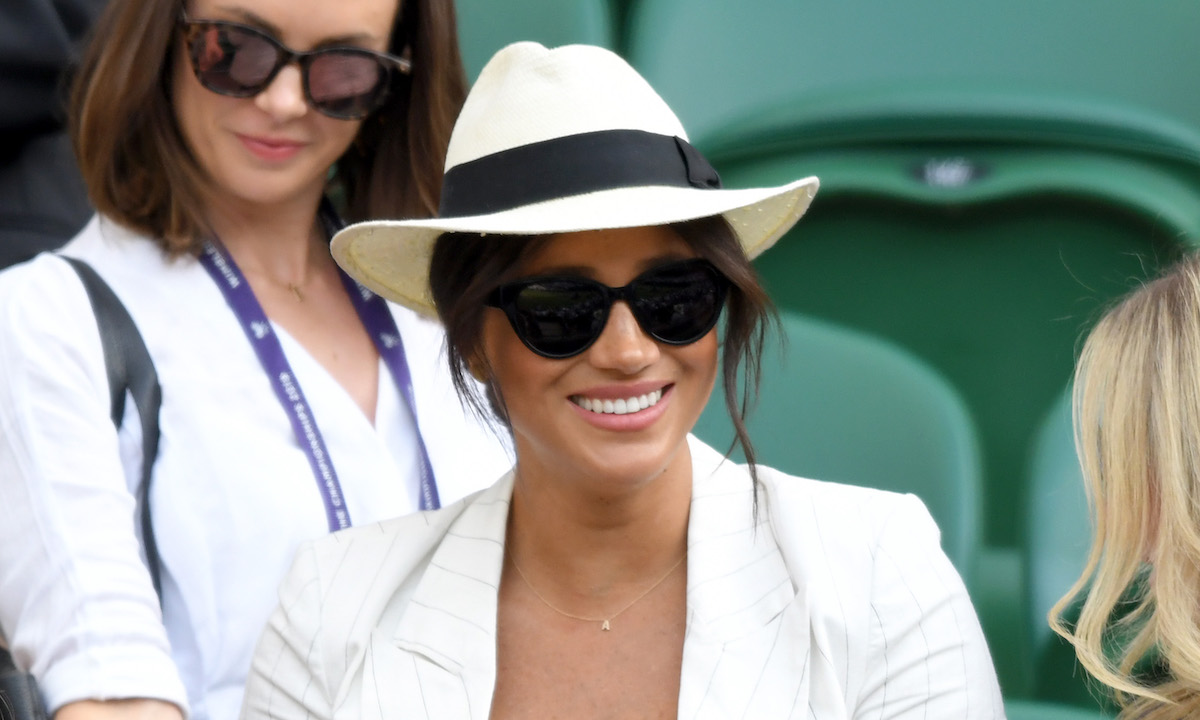 Meghan Markle debuts stunning £3000 sapphire ring at Wimbledon – but her summer hat is a trusty bargain